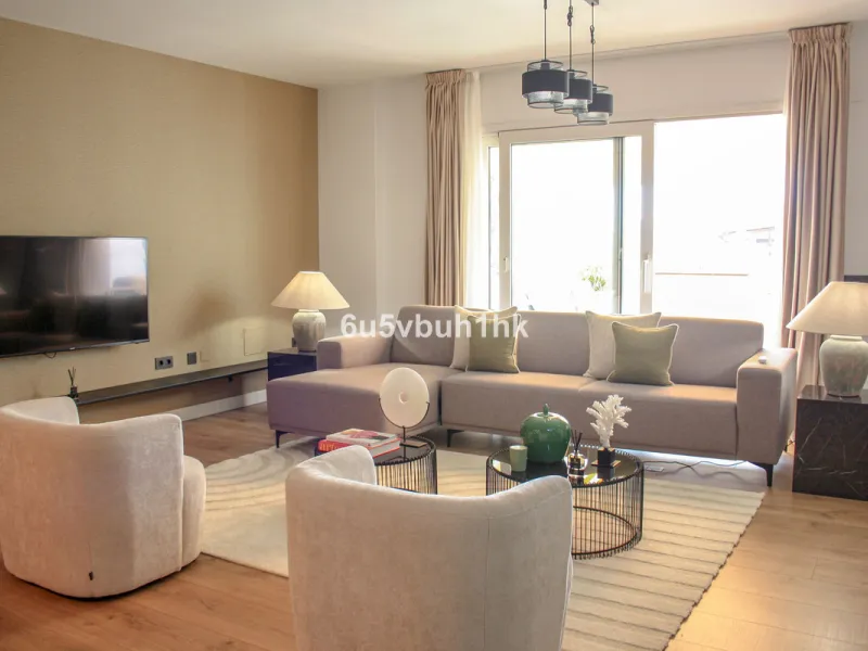 Experience the perfect harmony of luxury, comfort, and stunning panoramic views in this exceptional duplex penthouse, completely renovated and located on Marbella's prestigious Golden Mile.
