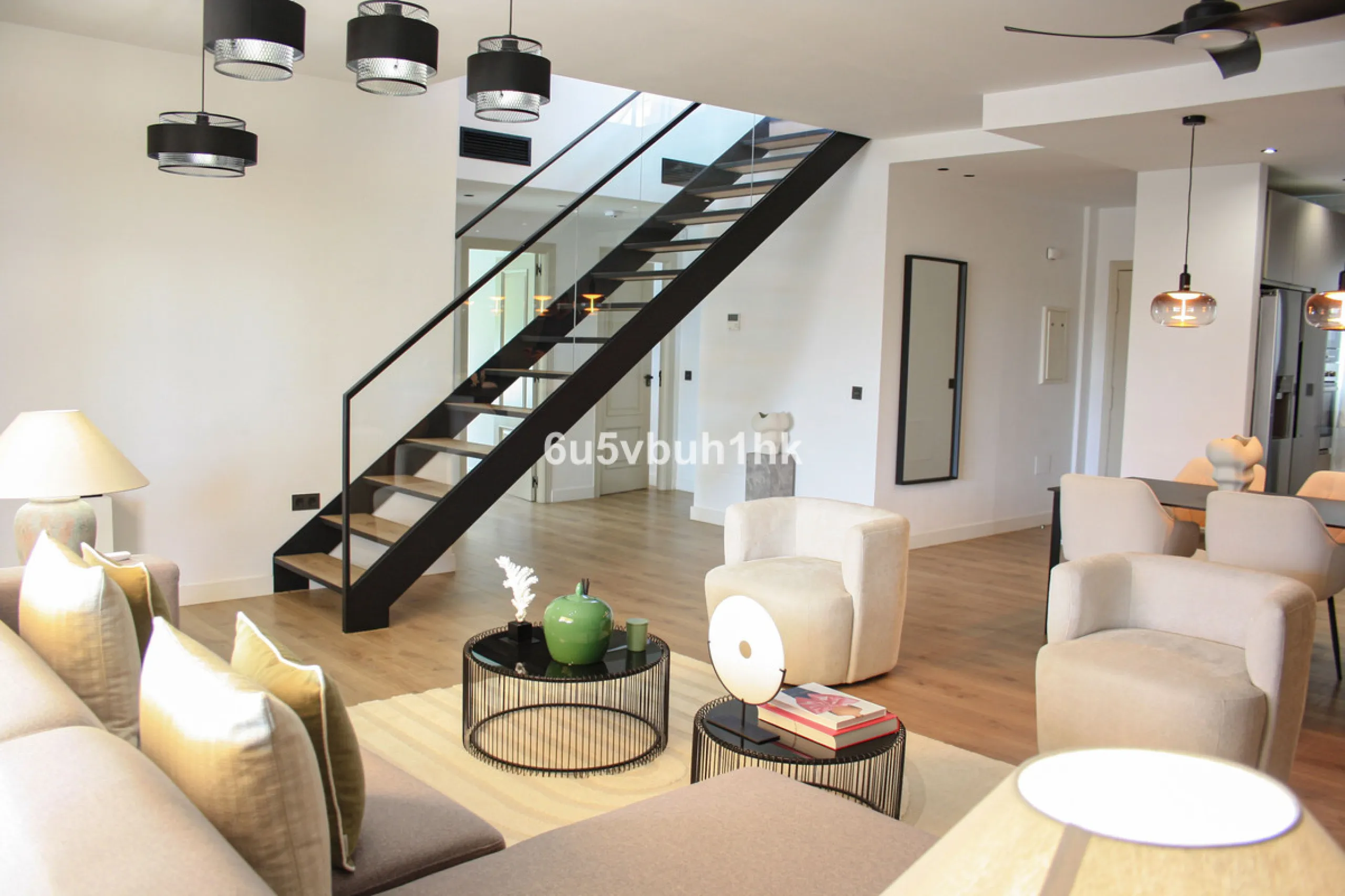 Experience the perfect harmony of luxury, comfort, and stunning panoramic views in this exceptional duplex penthouse, completely renovated and located on Marbella's prestigious Golden Mile.