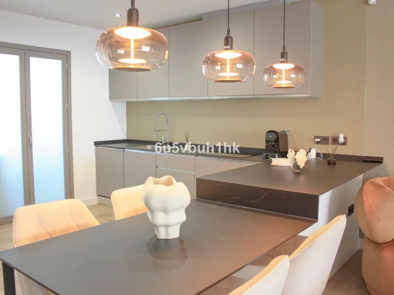 Experience the perfect harmony of luxury, comfort, and stunning panoramic views in this exceptional duplex penthouse, completely renovated and located on Marbella's prestigious Golden Mile.
