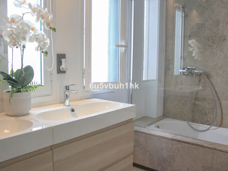 Experience the perfect harmony of luxury, comfort, and stunning panoramic views in this exceptional duplex penthouse, completely renovated and located on Marbella's prestigious Golden Mile.