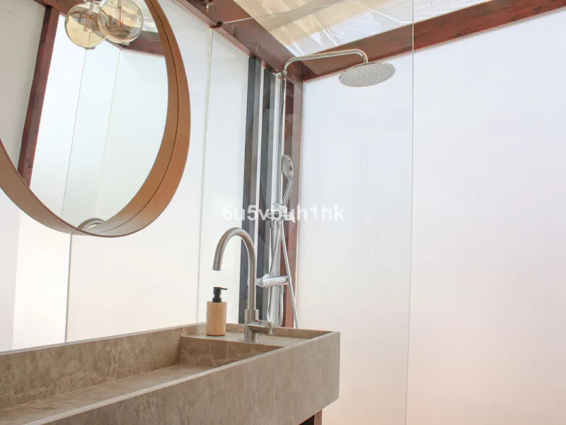 Experience the perfect harmony of luxury, comfort, and stunning panoramic views in this exceptional duplex penthouse, completely renovated and located on Marbella's prestigious Golden Mile.