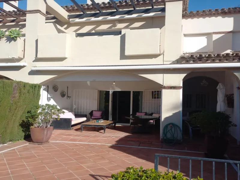 Superb spacious townhouse located in one of the most sought after urbanisations in Guadalmina Baja. Set in sumptuous landscaped gardens with a generous sized swimming pool. The property is on two storeys with a large storage in the basement and double gar