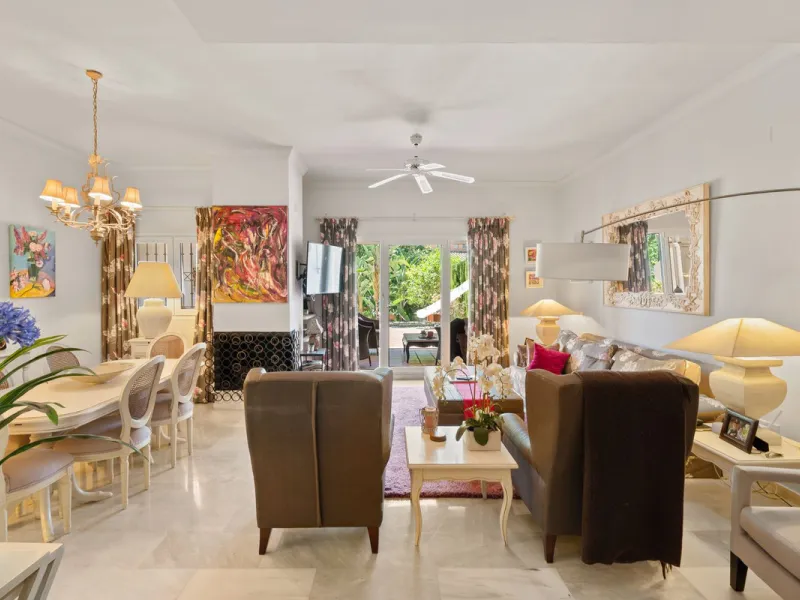 Superb spacious townhouse located in one of the most sought after urbanisations in Guadalmina Baja. Set in sumptuous landscaped gardens with a generous sized swimming pool. The property is on two storeys with a large storage in the basement and double gar
