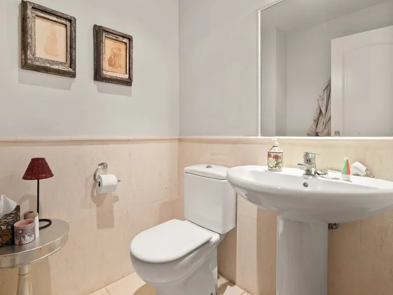 Superb spacious townhouse located in one of the most sought after urbanisations in Guadalmina Baja. Set in sumptuous landscaped gardens with a generous sized swimming pool. The property is on two storeys with a large storage in the basement and double gar