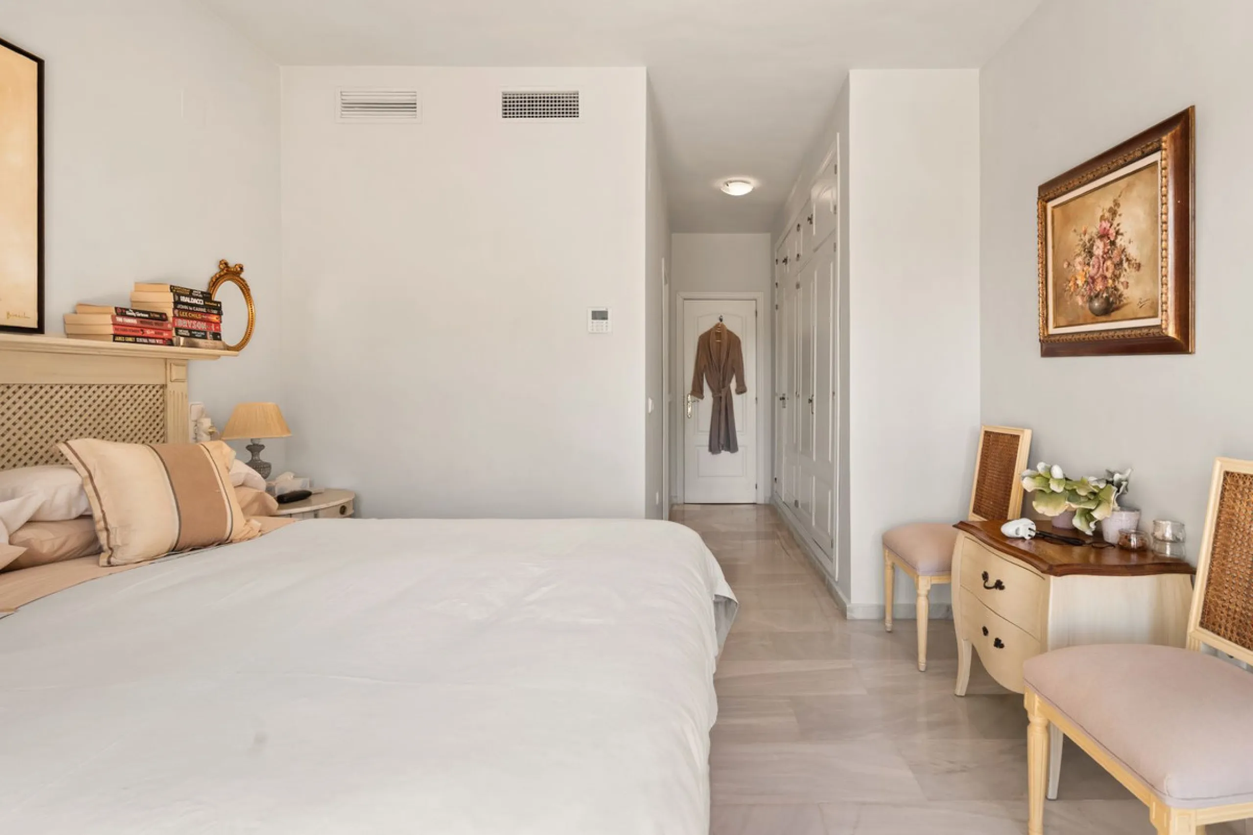 Superb spacious townhouse located in one of the most sought after urbanisations in Guadalmina Baja. Set in sumptuous landscaped gardens with a generous sized swimming pool. The property is on two storeys with a large storage in the basement and double gar