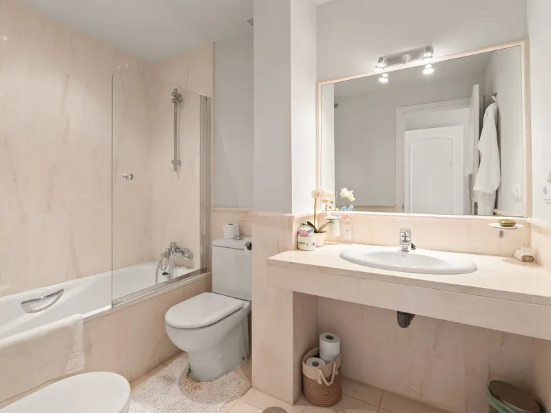 Superb spacious townhouse located in one of the most sought after urbanisations in Guadalmina Baja. Set in sumptuous landscaped gardens with a generous sized swimming pool. The property is on two storeys with a large storage in the basement and double gar