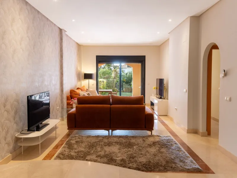 Very private South West facing garden apartment in this prestigious beachside development just meters from the sea only a short stroll to Puerto Banus. This 2 bed 2 bathroom 120m2 apartment has covered and uncovered terraces of 40m2 plus a private garden 