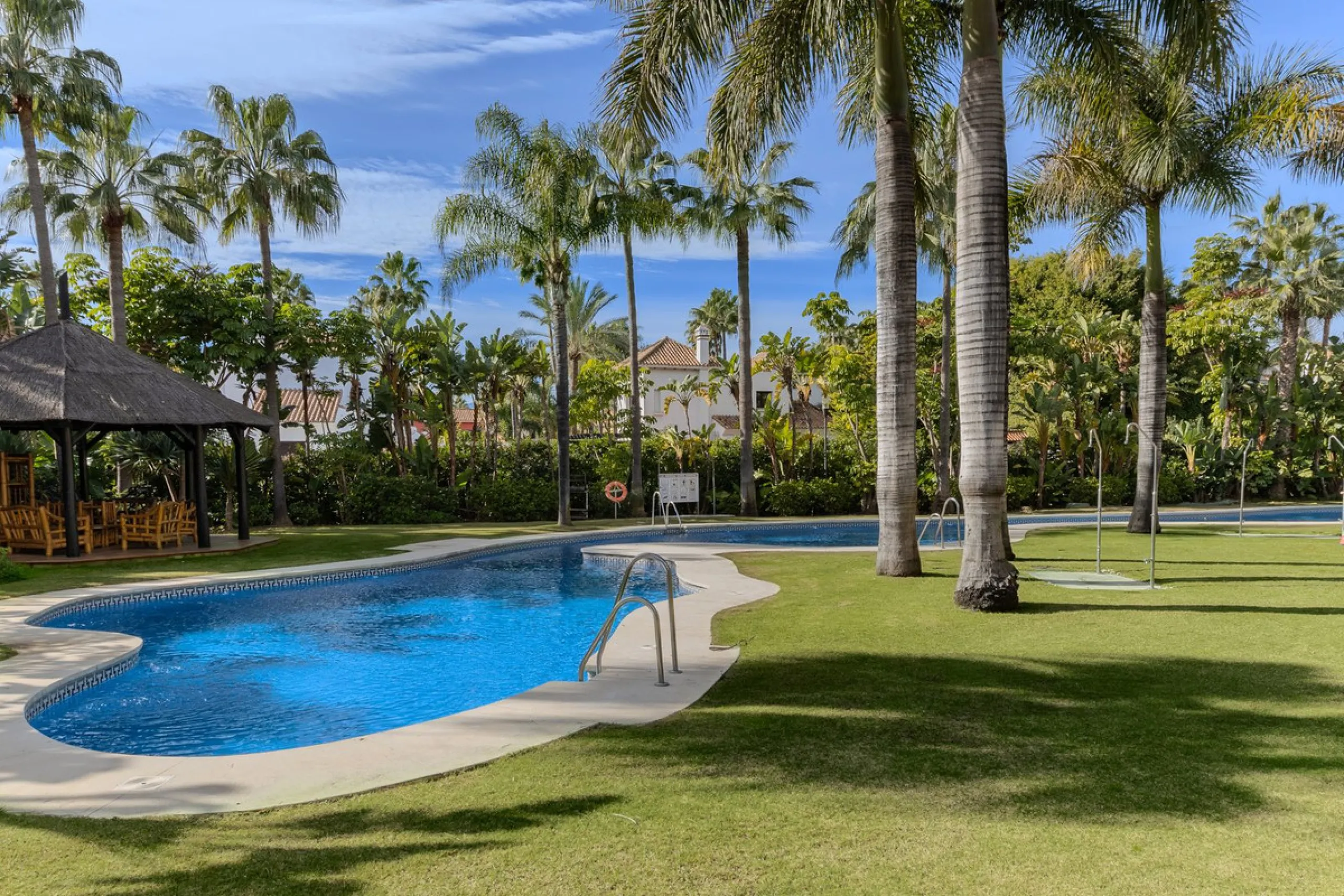 Very private South West facing garden apartment in this prestigious beachside development just meters from the sea only a short stroll to Puerto Banus. This 2 bed 2 bathroom 120m2 apartment has covered and uncovered terraces of 40m2 plus a private garden 