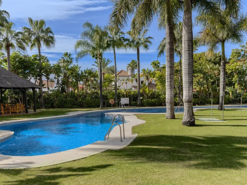 Very private South West facing garden apartment in this prestigious beachside development just meters from the sea only a short stroll to Puerto Banus. This 2 bed 2 bathroom 120m2 apartment has covered and uncovered terraces of 40m2 plus a private garden 