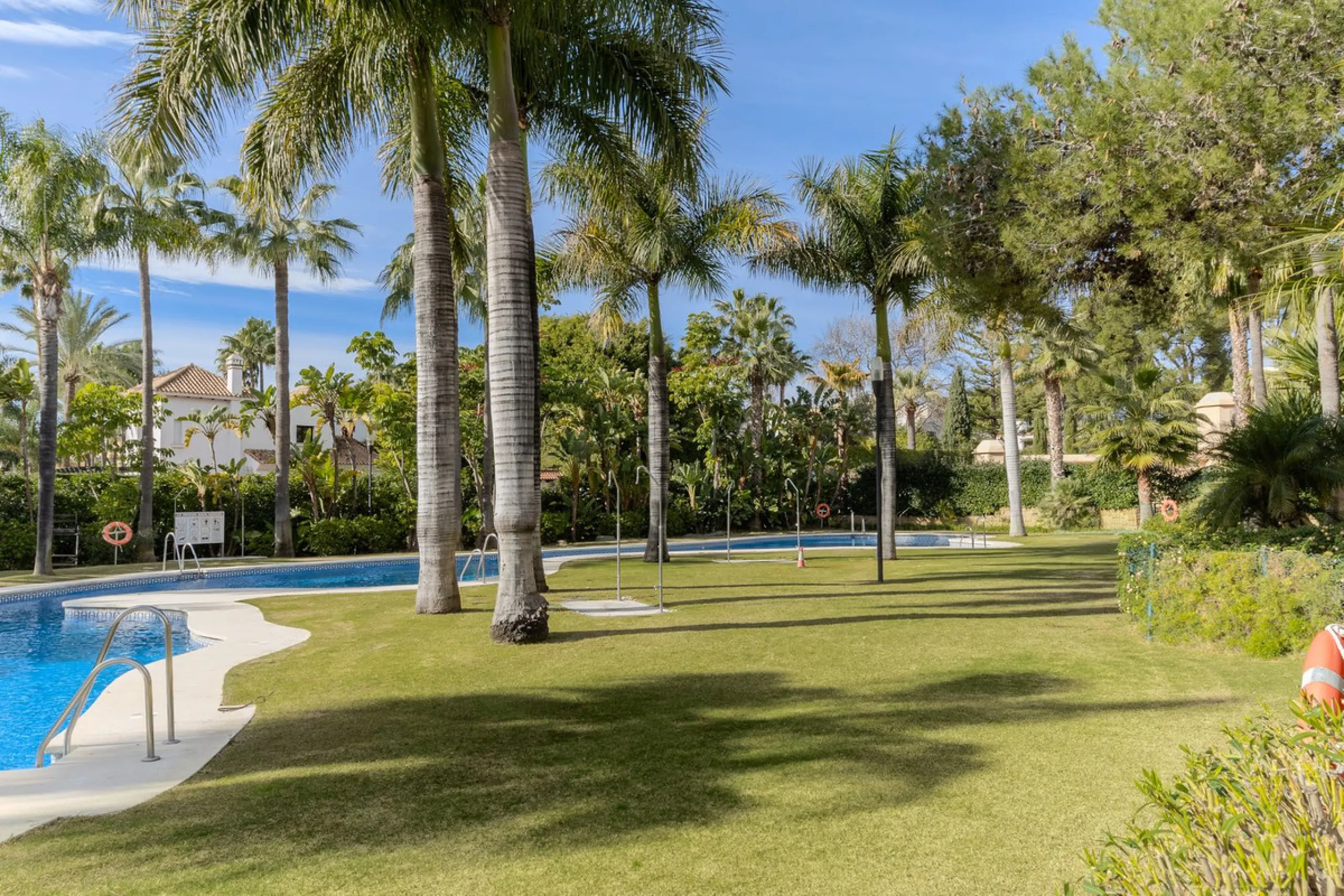 Very private South West facing garden apartment in this prestigious beachside development just meters from the sea only a short stroll to Puerto Banus. This 2 bed 2 bathroom 120m2 apartment has covered and uncovered terraces of 40m2 plus a private garden 