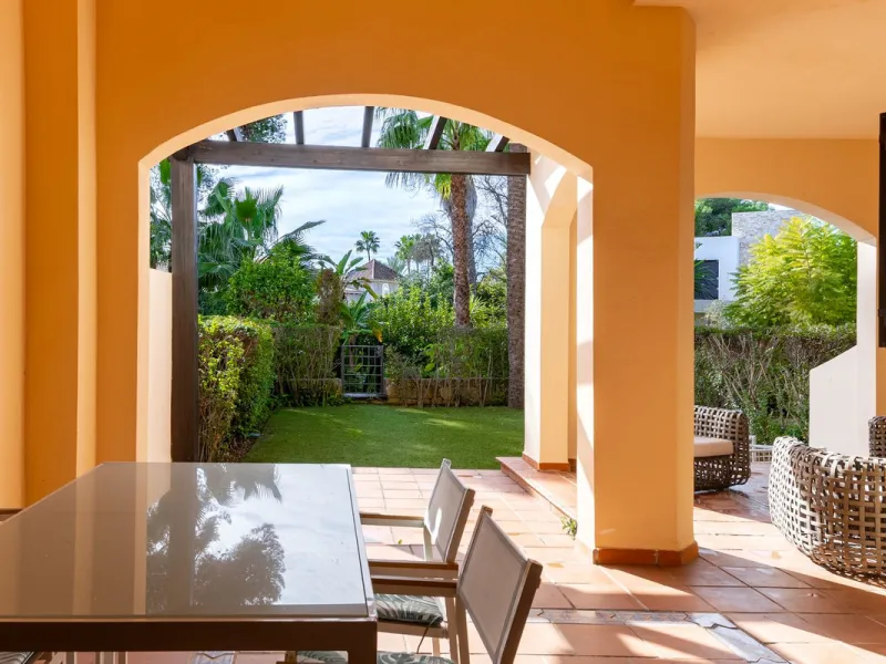 Very private South West facing garden apartment in this prestigious beachside development just meters from the sea only a short stroll to Puerto Banus. This 2 bed 2 bathroom 120m2 apartment has covered and uncovered terraces of 40m2 plus a private garden 