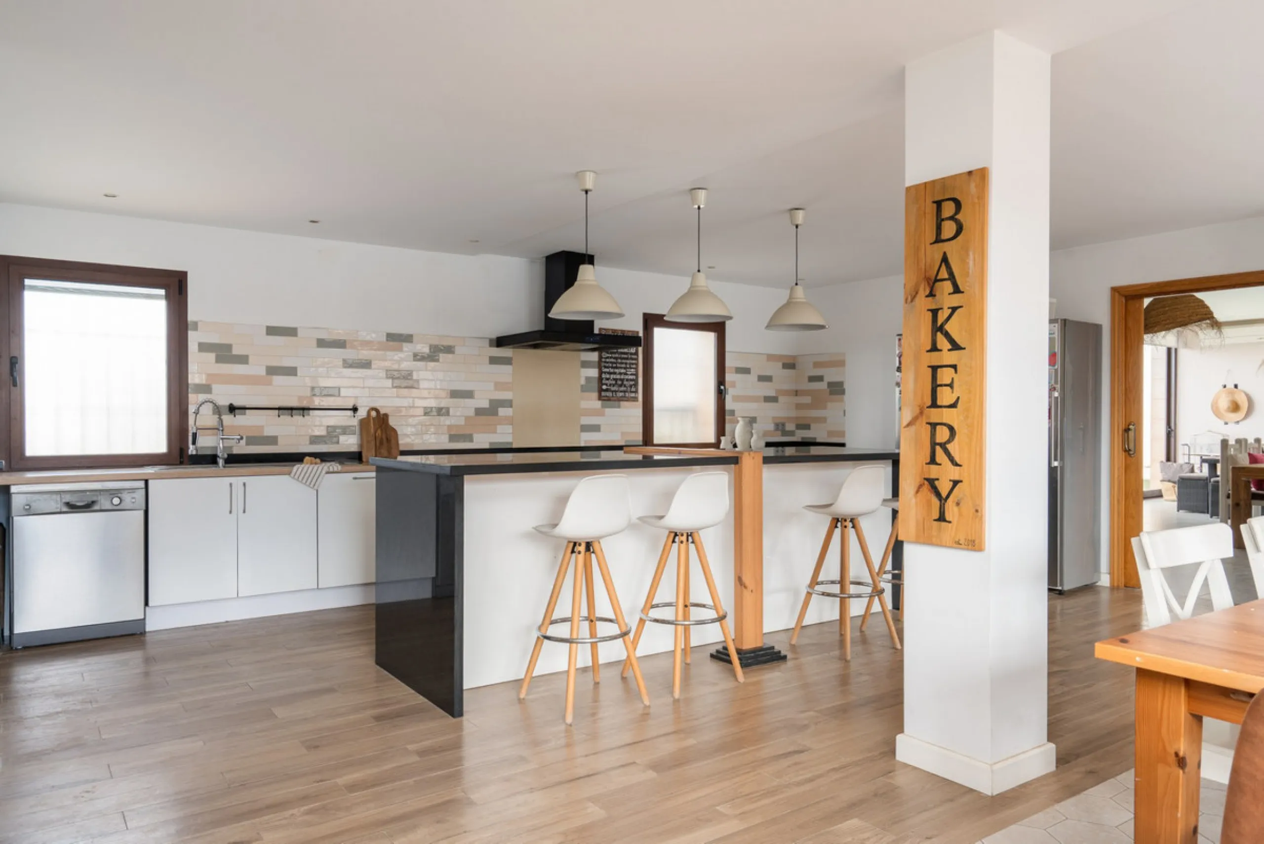 Originally designed as two semi-detached homes, the property offers outstanding adaptability and lends itself effortlessly to a variety of living arrangements — whether as a refined residence for a large family, two families or an elegant multigenerationa
