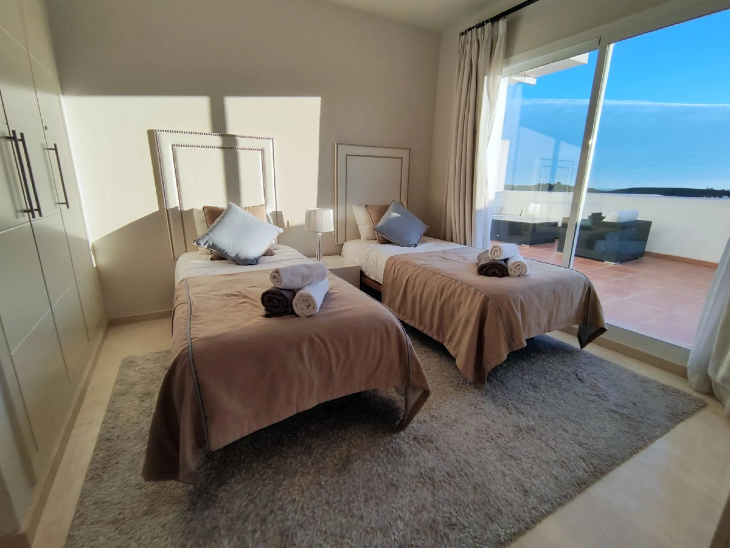 Accommodation for up to 4 guests is provided in a fully air-conditioned penthouse apartment with two double bedrooms, two bathrooms, a fully equipped kitchen with modern appliances, and a spacious living room. The 200 m² apartment includes a large terrace