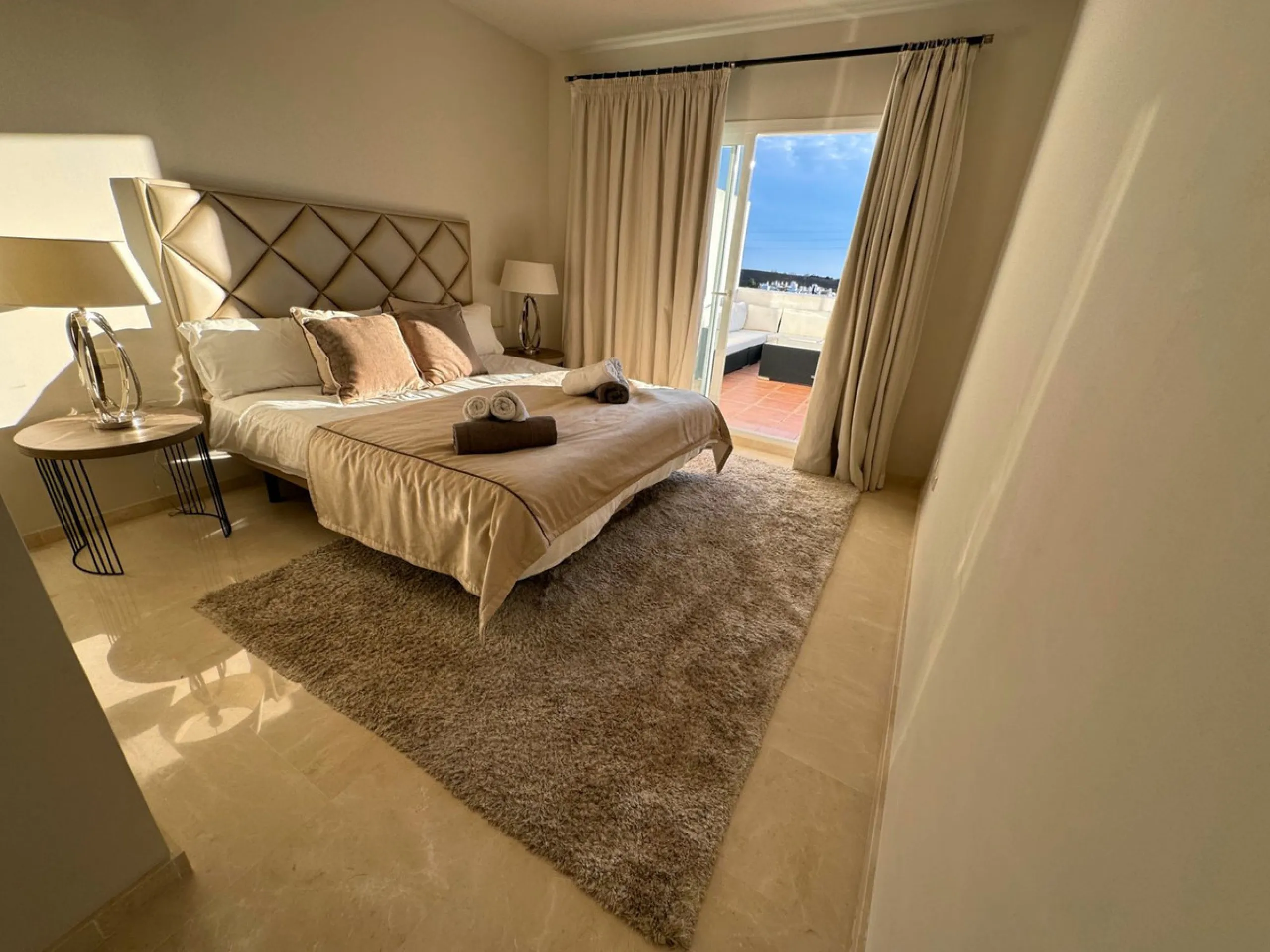Accommodation for up to 4 guests is provided in a fully air-conditioned penthouse apartment with two double bedrooms, two bathrooms, a fully equipped kitchen with modern appliances, and a spacious living room. The 200 m² apartment includes a large terrace