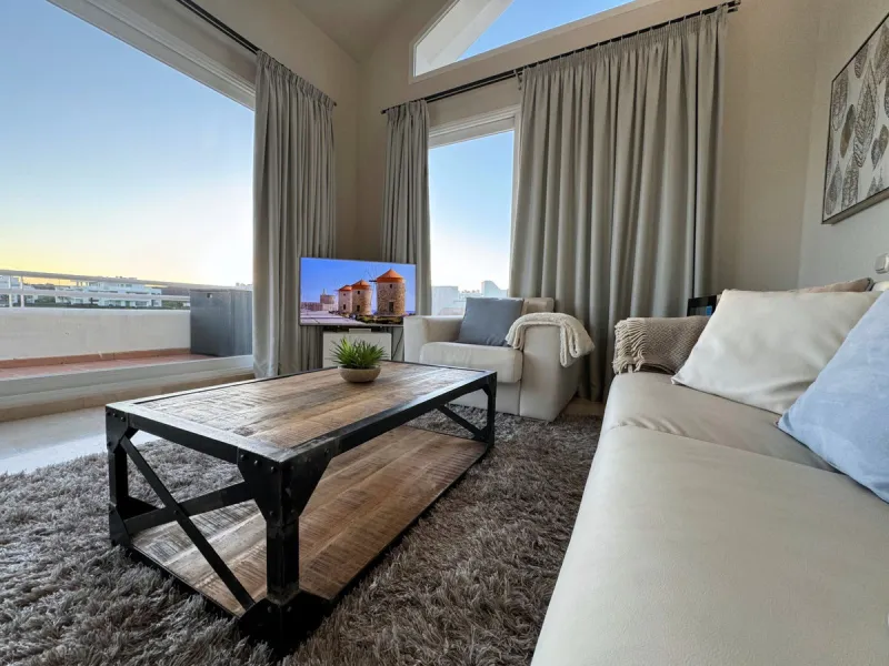 Accommodation for up to 4 guests is provided in a fully air-conditioned penthouse apartment with two double bedrooms, two bathrooms, a fully equipped kitchen with modern appliances, and a spacious living room. The 200 m² apartment includes a large terrace