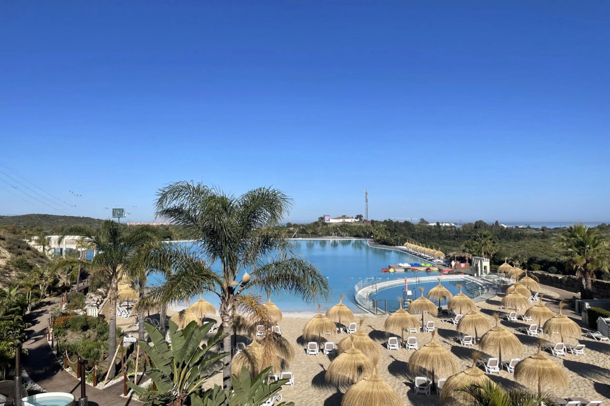 Accommodation for up to 4 guests is provided in a fully air-conditioned penthouse apartment with two double bedrooms, two bathrooms, a fully equipped kitchen with modern appliances, and a spacious living room. The 200 m² apartment includes a large terrace