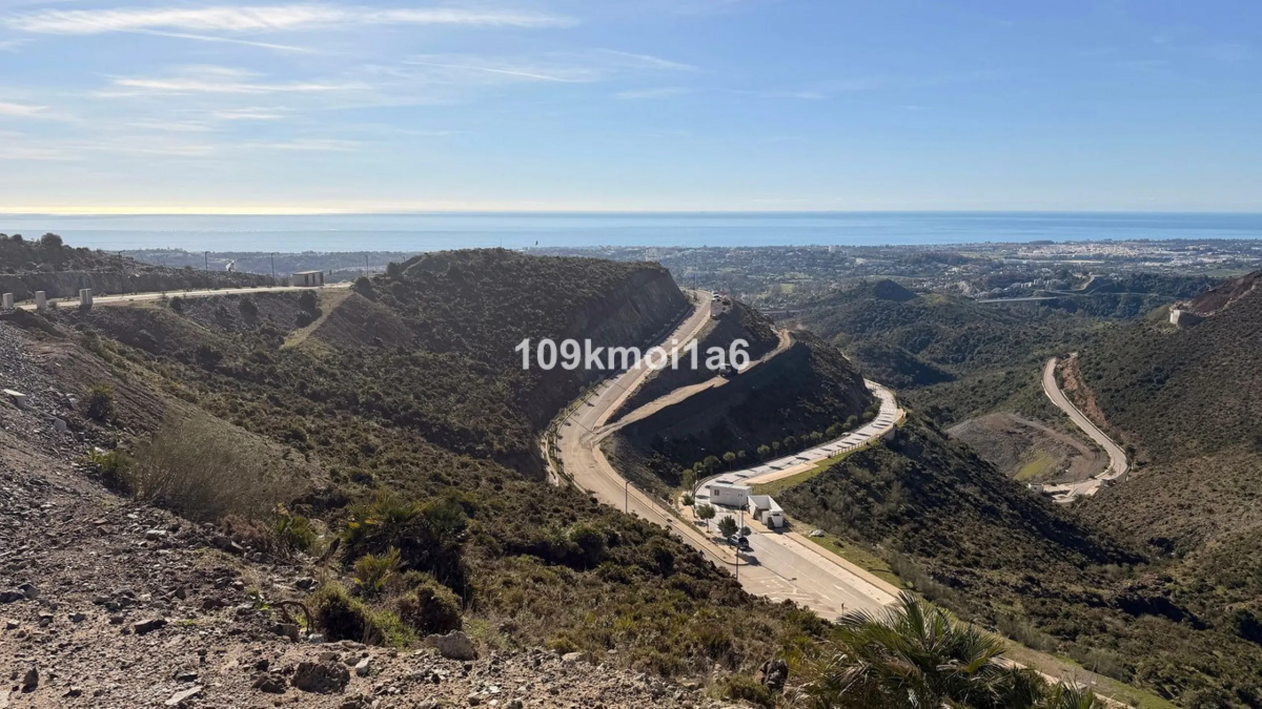 Build-Ready Plot with Panoramic Views in Gated Resort – Project & Licence Approved