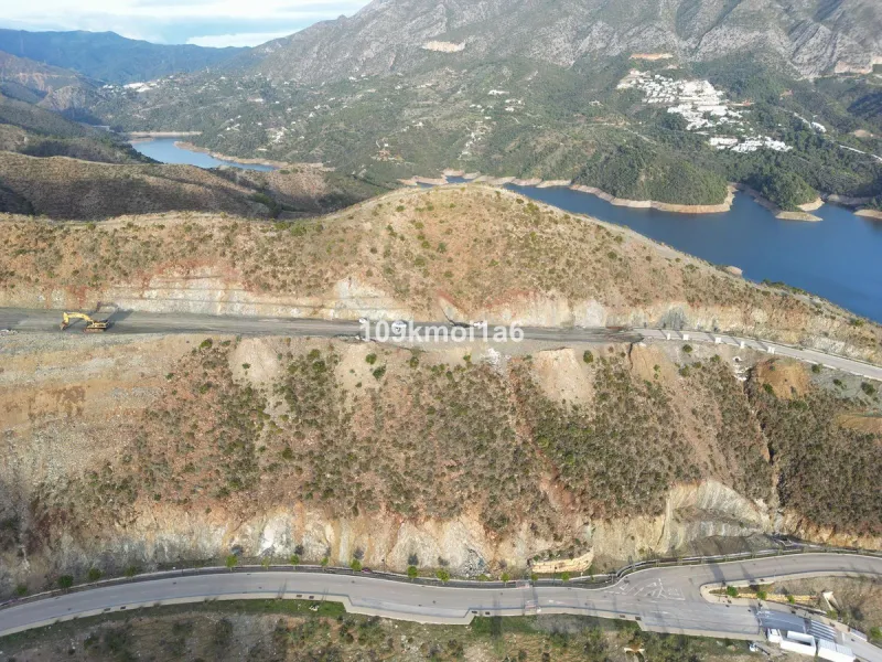 Build-Ready Plot with Panoramic Views in Gated Resort – Project & Licence Approved
