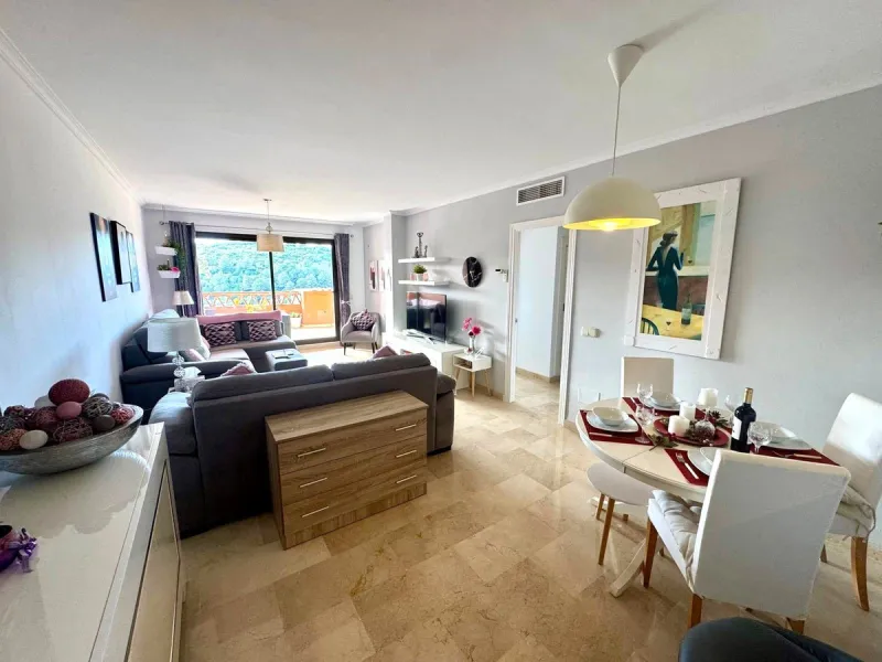 Discover your perfect slice of Costa del Sol life in Las Viñas del Golf, Casares Costa — a warm, inviting 2-bedroom, 2-bathroom apartment lovingly maintained by its current owner.