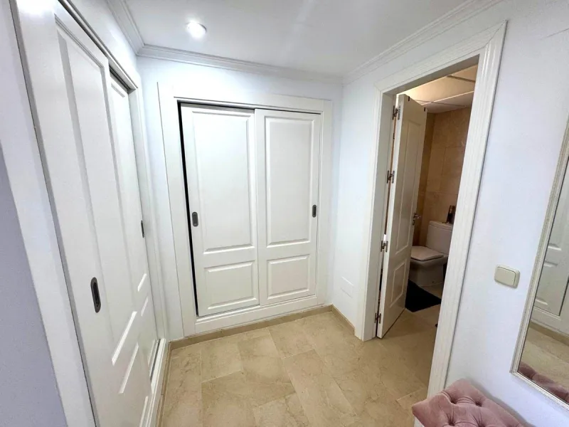 Discover your perfect slice of Costa del Sol life in Las Viñas del Golf, Casares Costa — a warm, inviting 2-bedroom, 2-bathroom apartment lovingly maintained by its current owner.