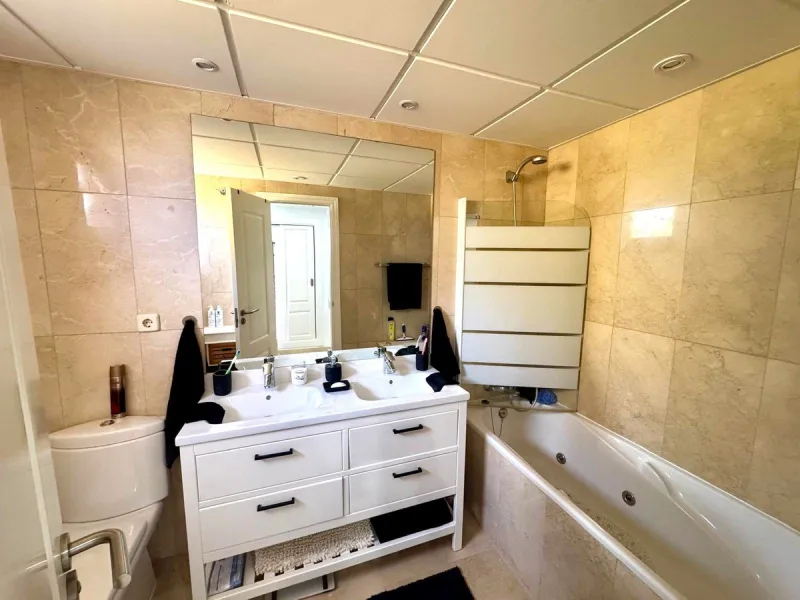 Discover your perfect slice of Costa del Sol life in Las Viñas del Golf, Casares Costa — a warm, inviting 2-bedroom, 2-bathroom apartment lovingly maintained by its current owner.