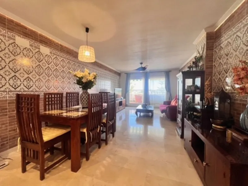 This charming top-floor apartment, located in the sought-after Guadalmina Baja, offers a comfortable and modern living experience. The apartment features two spacious bedrooms and two renovated bathrooms. The open-concept layout creates a seamless flow be