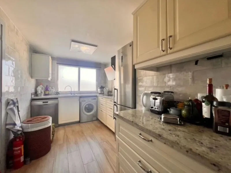 This charming top-floor apartment, located in the sought-after Guadalmina Baja, offers a comfortable and modern living experience. The apartment features two spacious bedrooms and two renovated bathrooms. The open-concept layout creates a seamless flow be