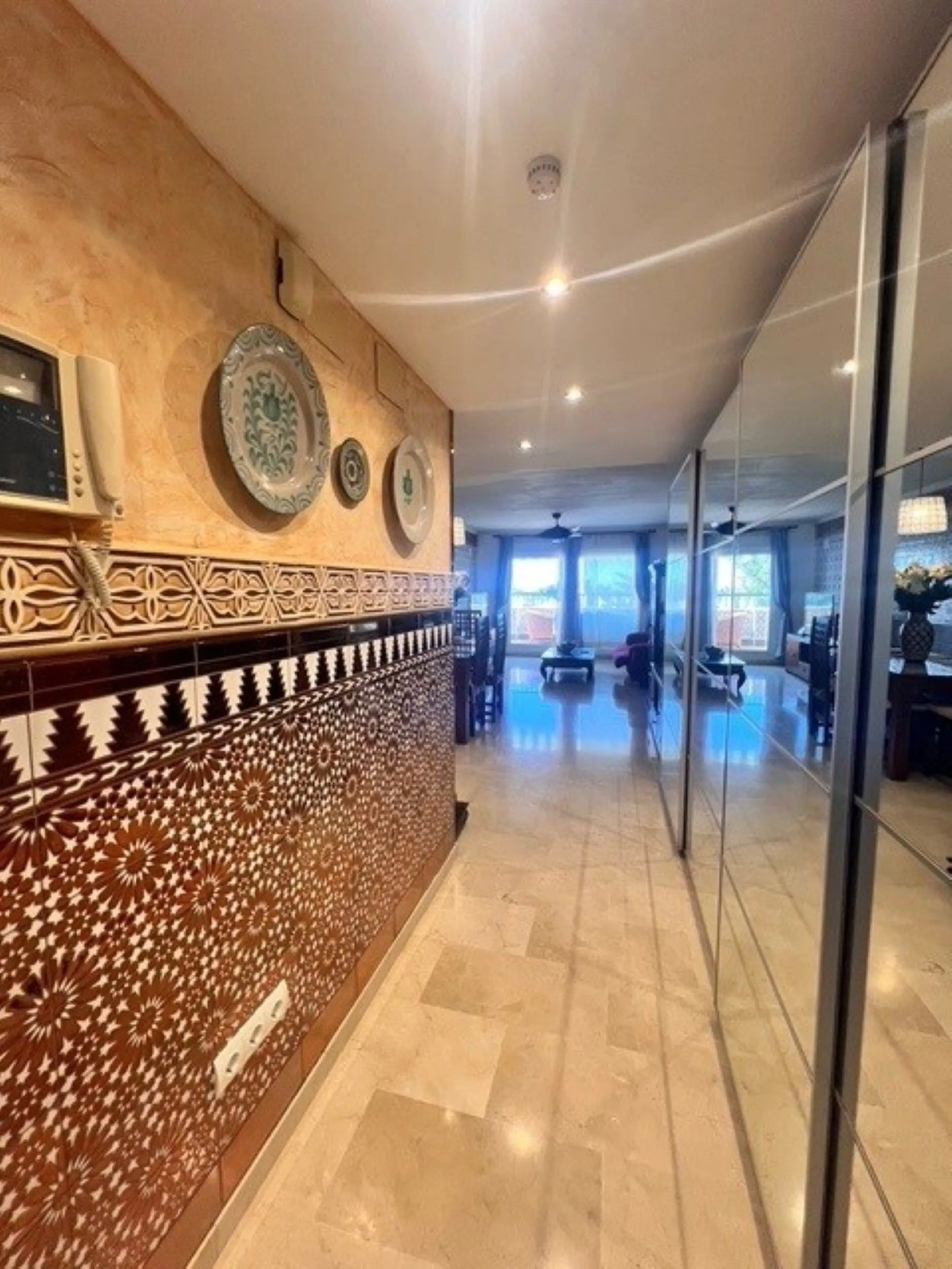 This charming top-floor apartment, located in the sought-after Guadalmina Baja, offers a comfortable and modern living experience. The apartment features two spacious bedrooms and two renovated bathrooms. The open-concept layout creates a seamless flow be