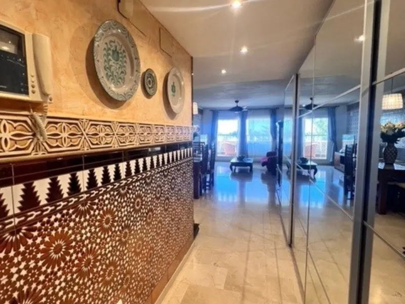This charming top-floor apartment, located in the sought-after Guadalmina Baja, offers a comfortable and modern living experience. The apartment features two spacious bedrooms and two renovated bathrooms. The open-concept layout creates a seamless flow be