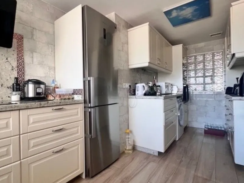 This charming top-floor apartment, located in the sought-after Guadalmina Baja, offers a comfortable and modern living experience. The apartment features two spacious bedrooms and two renovated bathrooms. The open-concept layout creates a seamless flow be