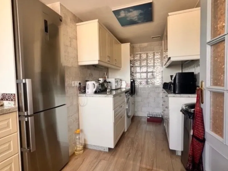 This charming top-floor apartment, located in the sought-after Guadalmina Baja, offers a comfortable and modern living experience. The apartment features two spacious bedrooms and two renovated bathrooms. The open-concept layout creates a seamless flow be
