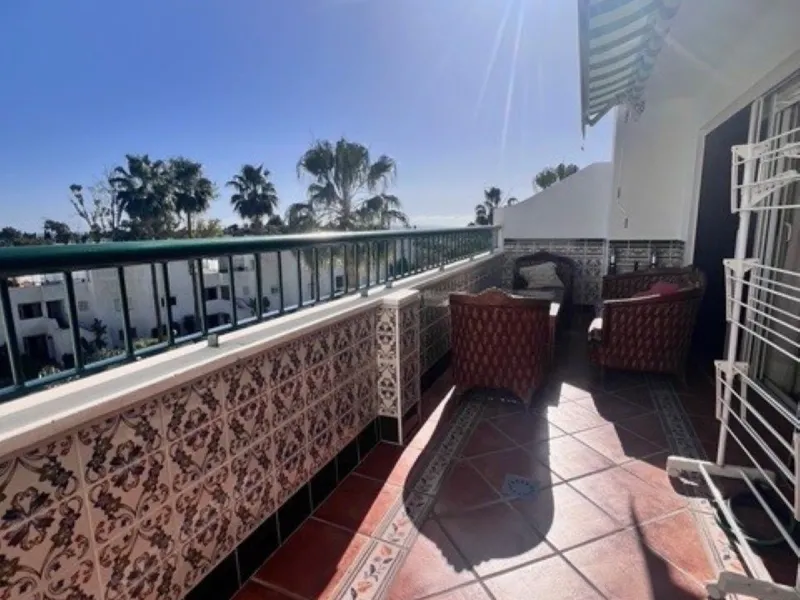 This charming top-floor apartment, located in the sought-after Guadalmina Baja, offers a comfortable and modern living experience. The apartment features two spacious bedrooms and two renovated bathrooms. The open-concept layout creates a seamless flow be