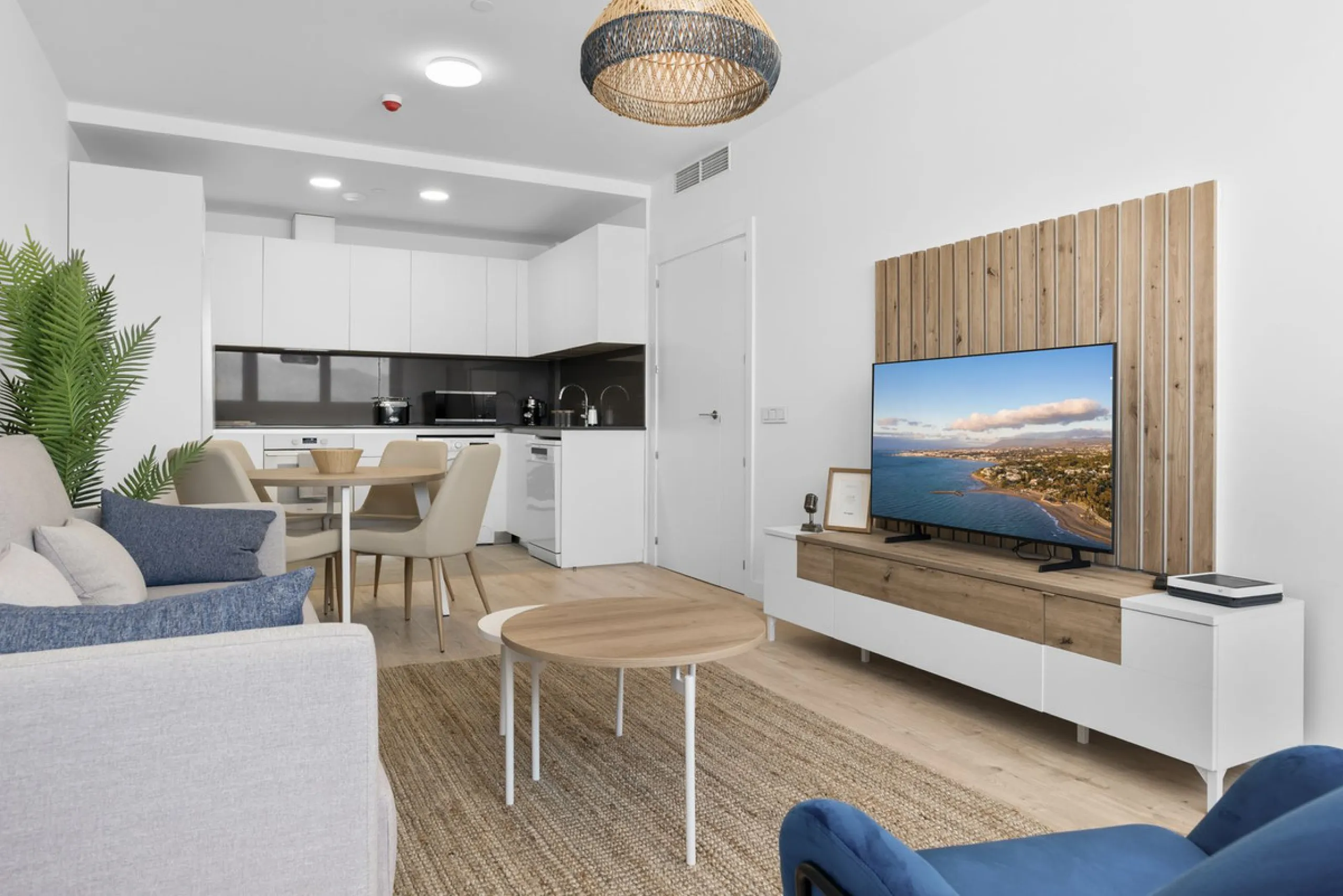 Experience elevated city living in this exceptional 24th-floor apartment in one of Málaga's most exciting new residential developments. Perfectly positioned in the heart of the city, this sleek and modern home offers spectacular panoramic views over the c