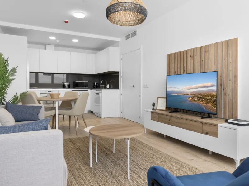 Experience elevated city living in this exceptional 24th-floor apartment in one of Málaga's most exciting new residential developments. Perfectly positioned in the heart of the city, this sleek and modern home offers spectacular panoramic views over the c