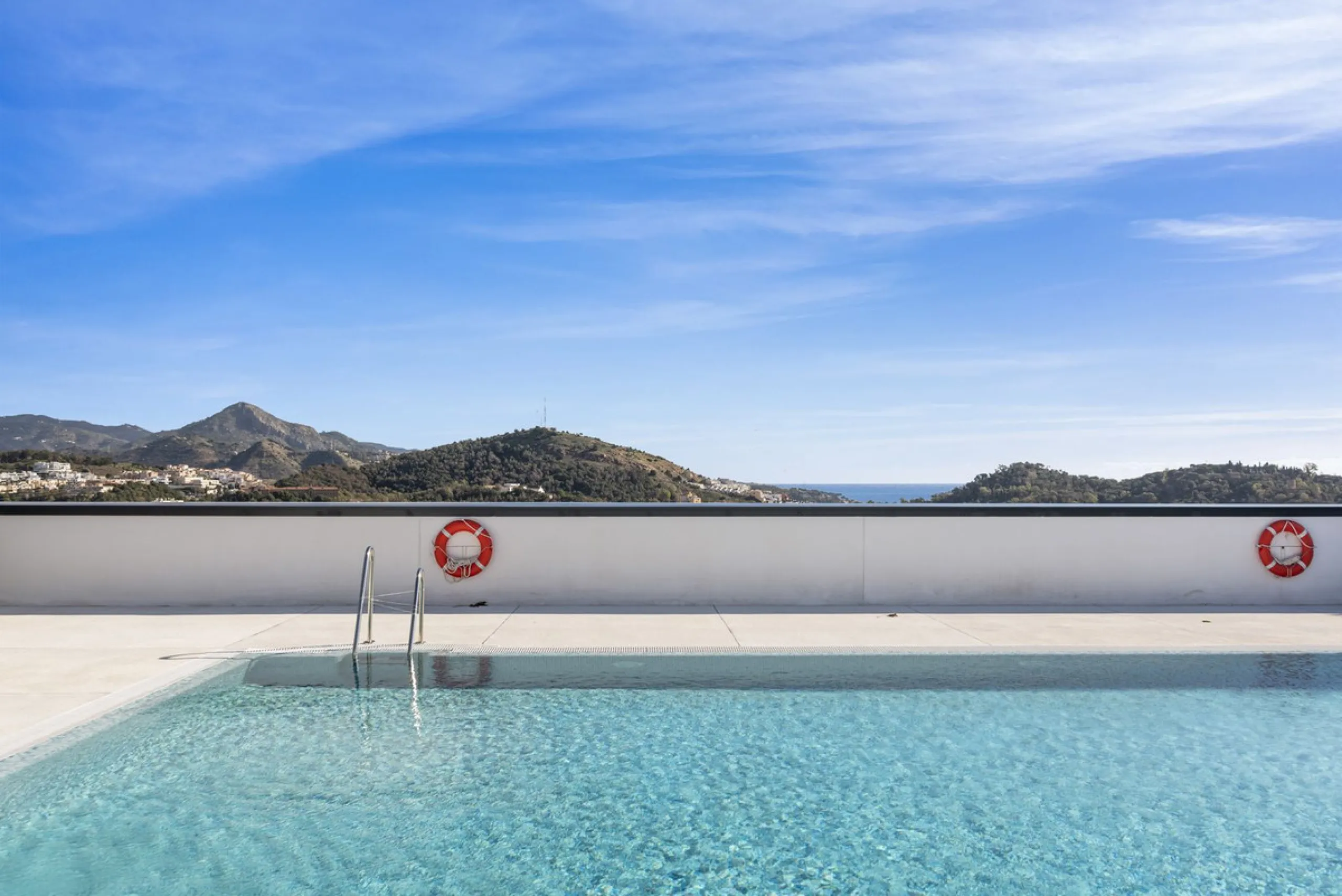Experience elevated city living in this exceptional 24th-floor apartment in one of Málaga's most exciting new residential developments. Perfectly positioned in the heart of the city, this sleek and modern home offers spectacular panoramic views over the c