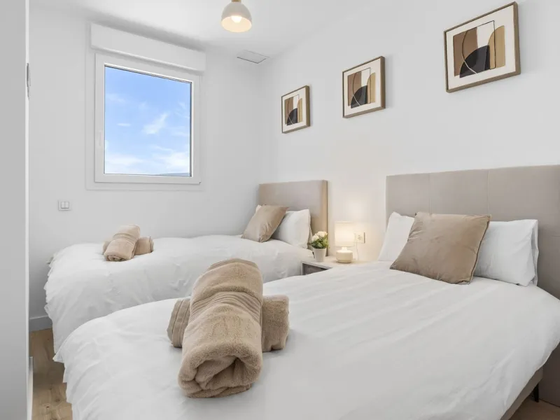 Experience elevated city living in this exceptional 24th-floor apartment in one of Málaga's most exciting new residential developments. Perfectly positioned in the heart of the city, this sleek and modern home offers spectacular panoramic views over the c