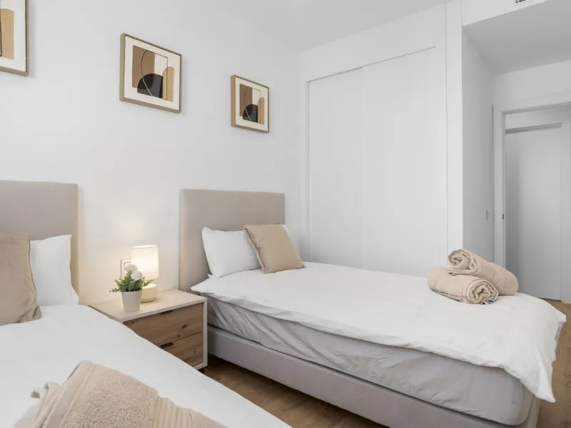 Experience elevated city living in this exceptional 24th-floor apartment in one of Málaga's most exciting new residential developments. Perfectly positioned in the heart of the city, this sleek and modern home offers spectacular panoramic views over the c