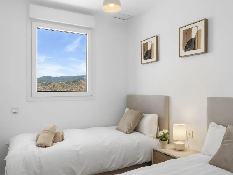 Experience elevated city living in this exceptional 24th-floor apartment in one of Málaga's most exciting new residential developments. Perfectly positioned in the heart of the city, this sleek and modern home offers spectacular panoramic views over the c