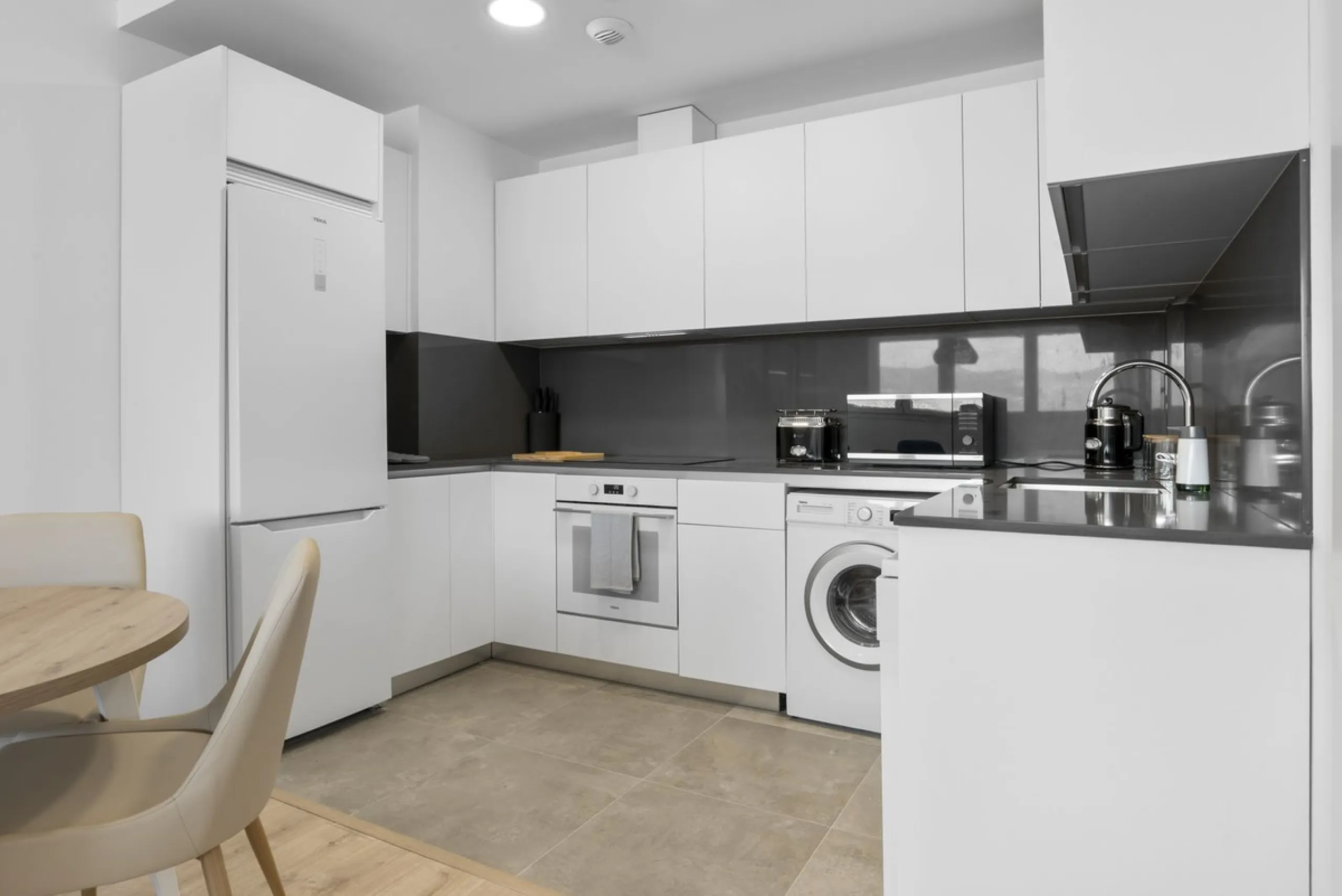 Experience elevated city living in this exceptional 24th-floor apartment in one of Málaga's most exciting new residential developments. Perfectly positioned in the heart of the city, this sleek and modern home offers spectacular panoramic views over the c