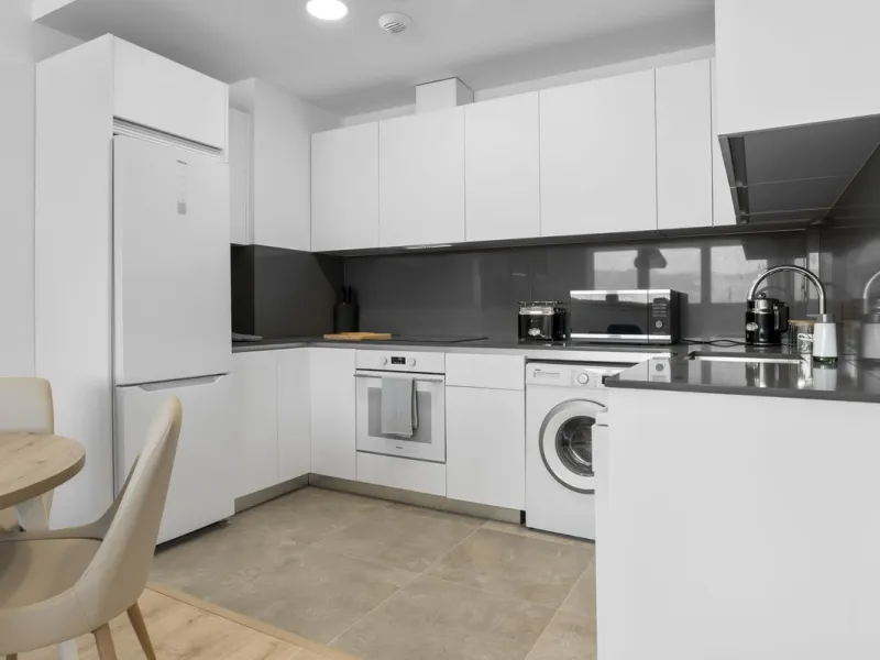 Experience elevated city living in this exceptional 24th-floor apartment in one of Málaga's most exciting new residential developments. Perfectly positioned in the heart of the city, this sleek and modern home offers spectacular panoramic views over the c