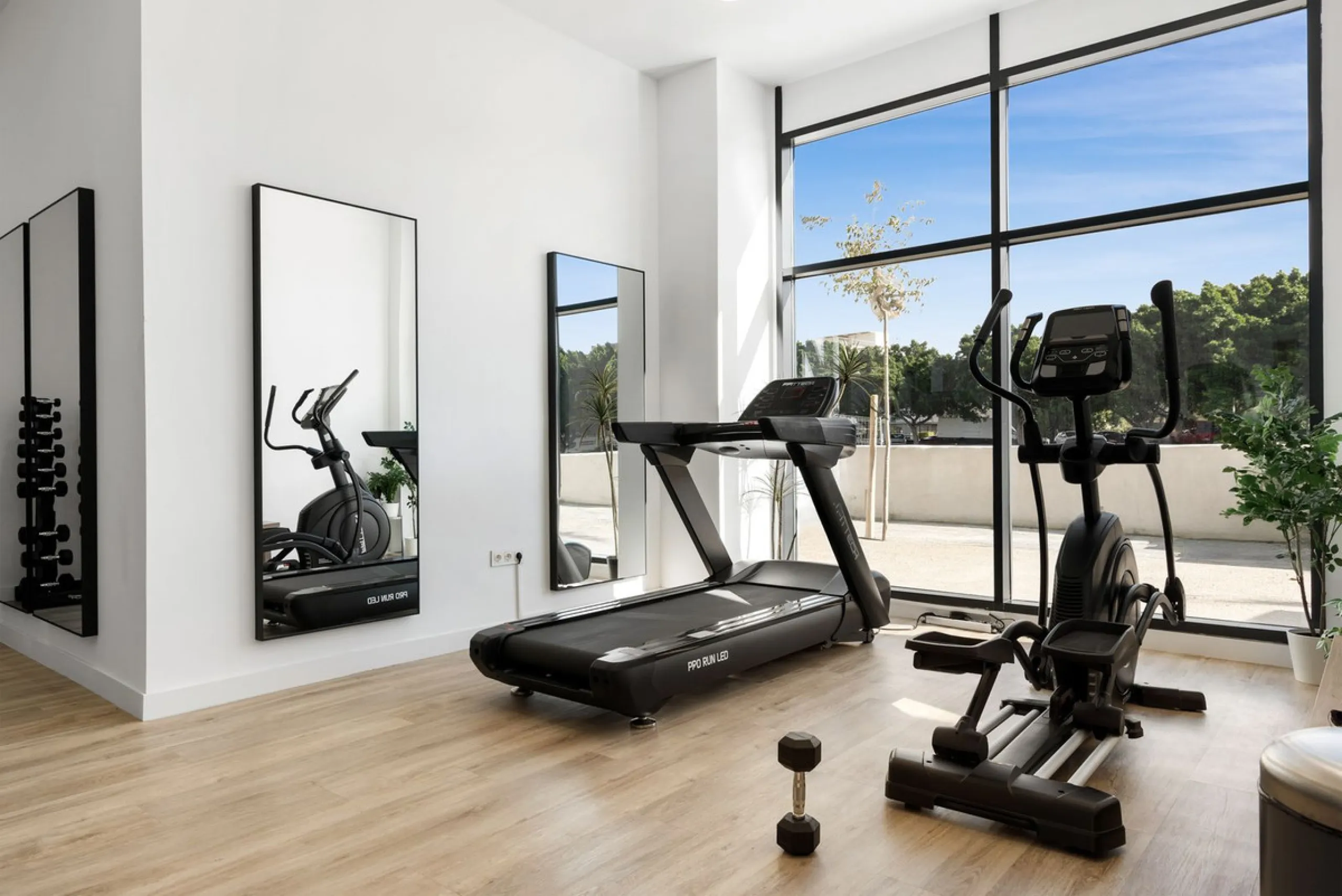 Experience elevated city living in this exceptional 24th-floor apartment in one of Málaga's most exciting new residential developments. Perfectly positioned in the heart of the city, this sleek and modern home offers spectacular panoramic views over the c