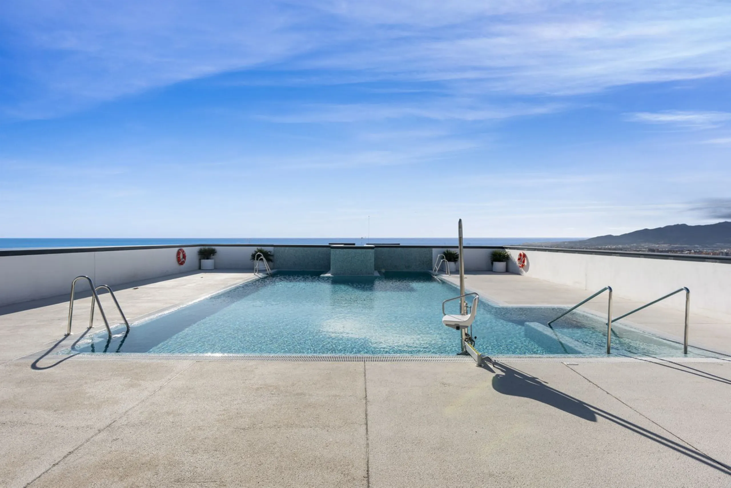 Experience elevated city living in this exceptional 24th-floor apartment in one of Málaga's most exciting new residential developments. Perfectly positioned in the heart of the city, this sleek and modern home offers spectacular panoramic views over the c