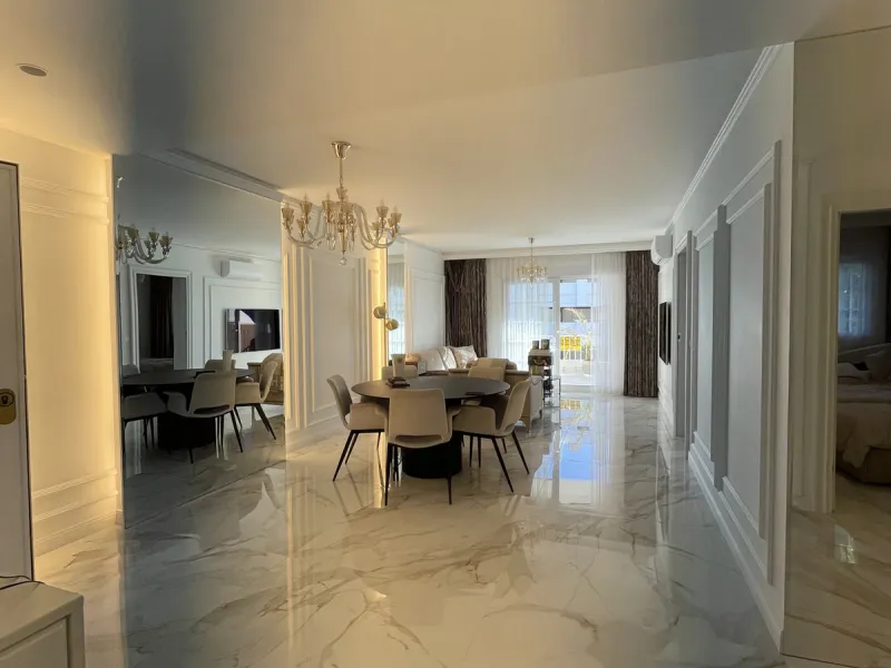 This exceptional luxury apartment is situated in the prestigious Puente Romano enclave on Marbella's renowned Golden Mile, Malaga.