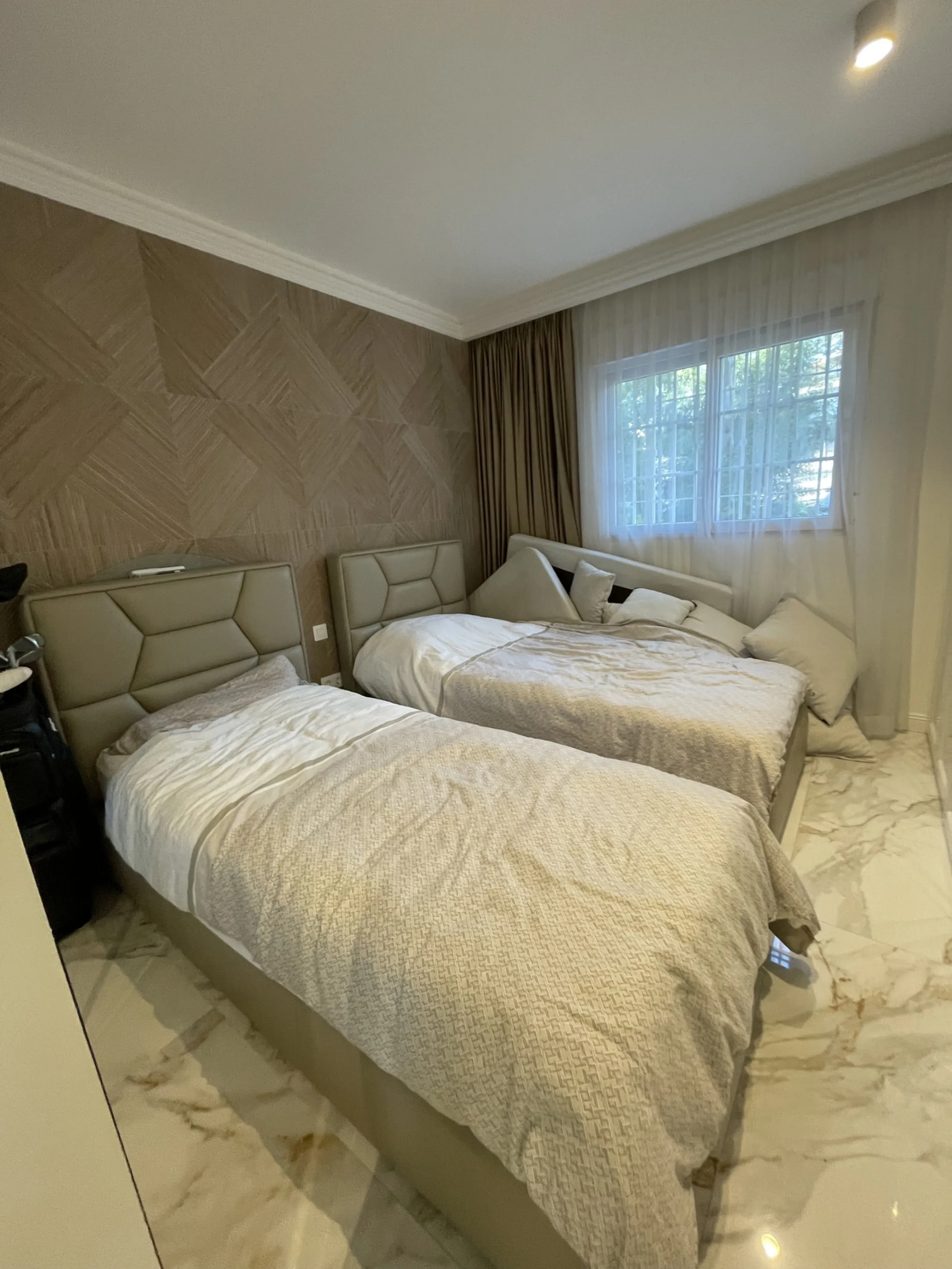 This exceptional luxury apartment is situated in the prestigious Puente Romano enclave on Marbella's renowned Golden Mile, Malaga.