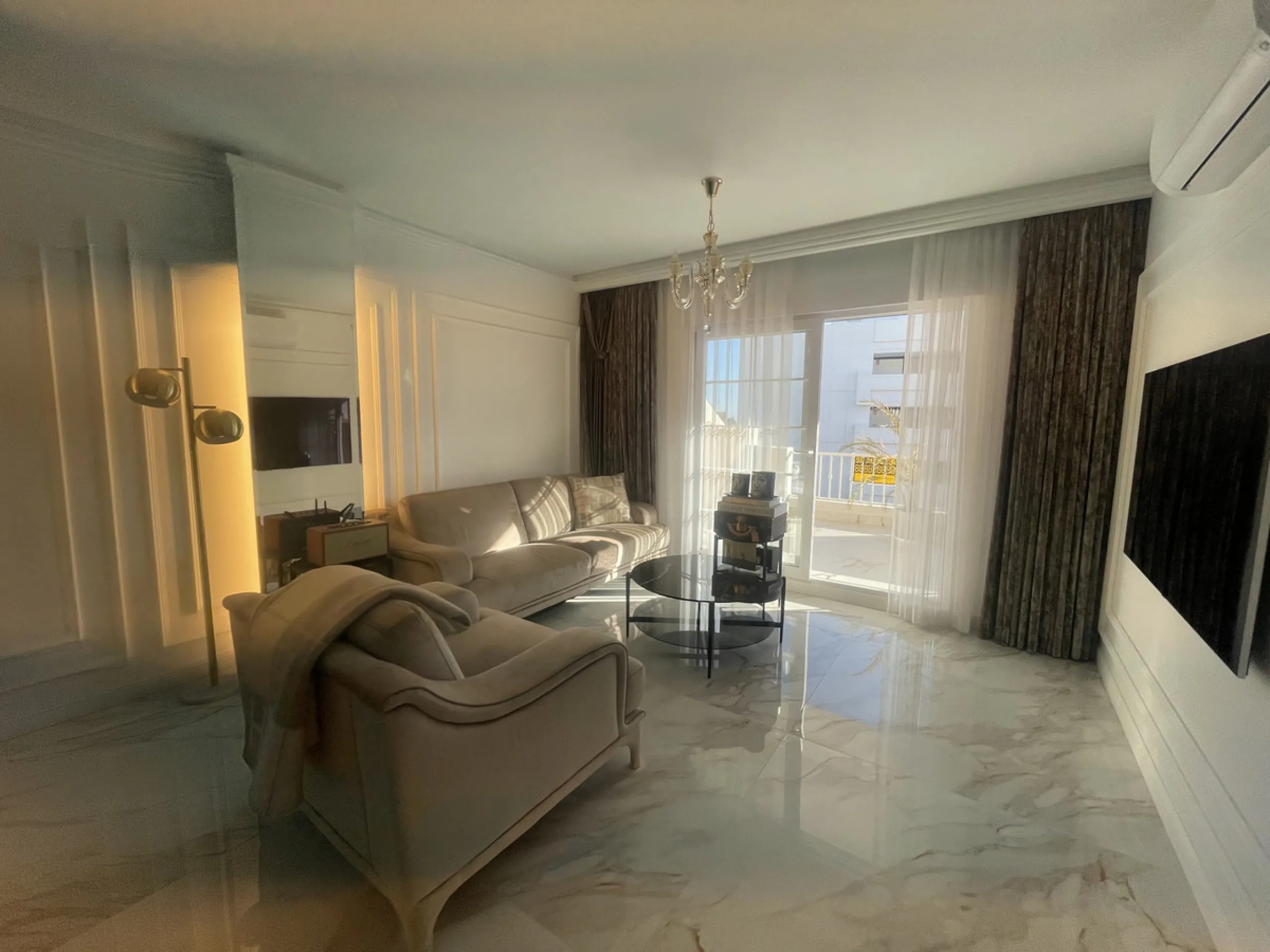 This exceptional luxury apartment is situated in the prestigious Puente Romano enclave on Marbella's renowned Golden Mile, Malaga.