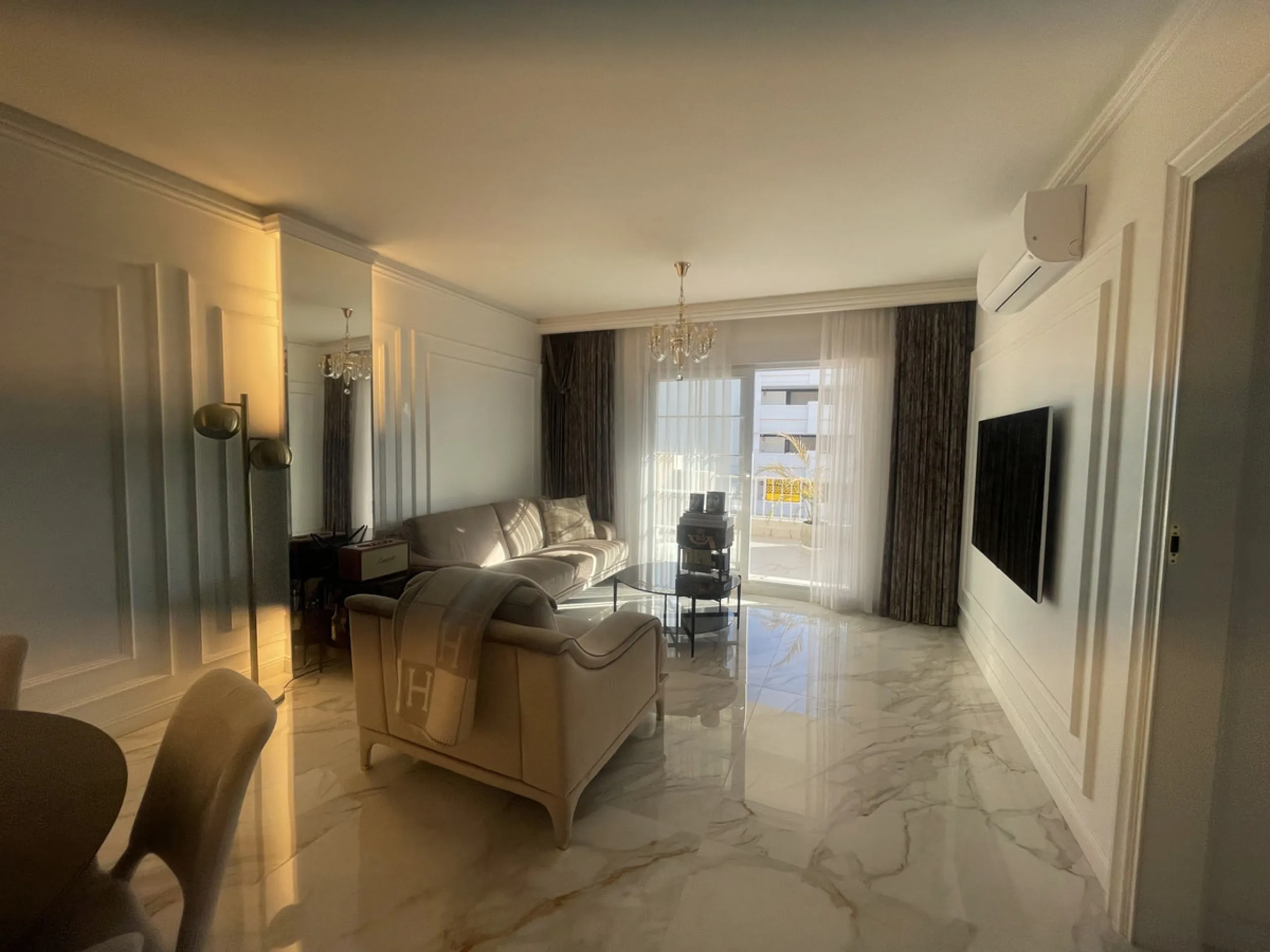 This exceptional luxury apartment is situated in the prestigious Puente Romano enclave on Marbella's renowned Golden Mile, Malaga.