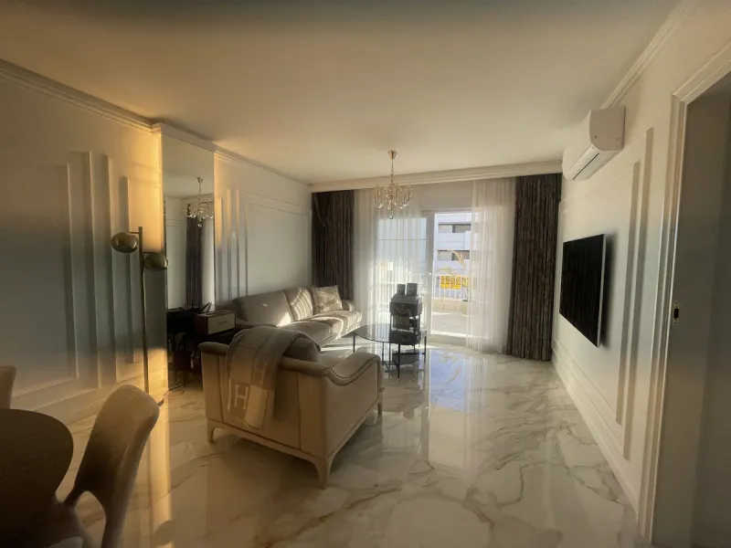 This exceptional luxury apartment is situated in the prestigious Puente Romano enclave on Marbella's renowned Golden Mile, Malaga.
