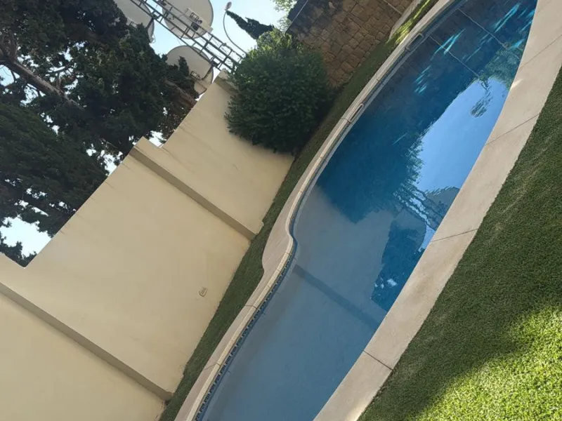 This exceptional luxury apartment is situated in the prestigious Puente Romano enclave on Marbella's renowned Golden Mile, Malaga.