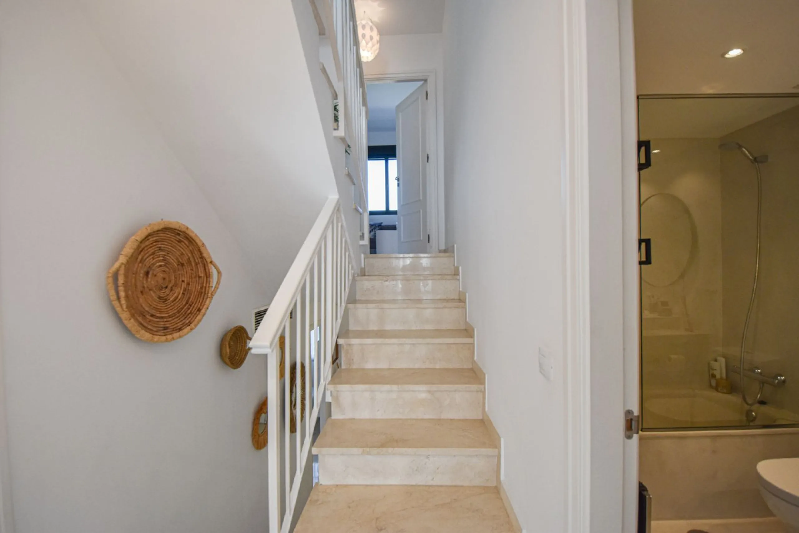 Discover this exclusive townhouse just steps from the beach, located in one of the most sought-after areas of Marbella, on the beachfront of Guadalmina Baja/San Pedro de Alcántara.