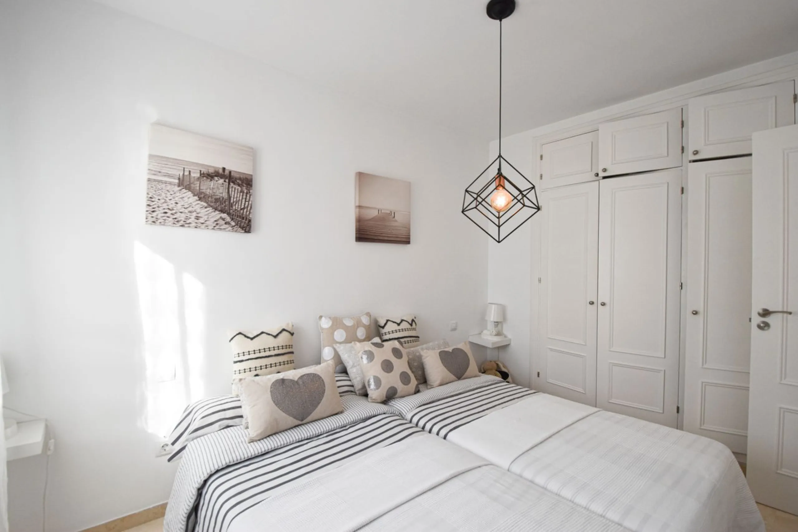 Discover this exclusive townhouse just steps from the beach, located in one of the most sought-after areas of Marbella, on the beachfront of Guadalmina Baja/San Pedro de Alcántara.